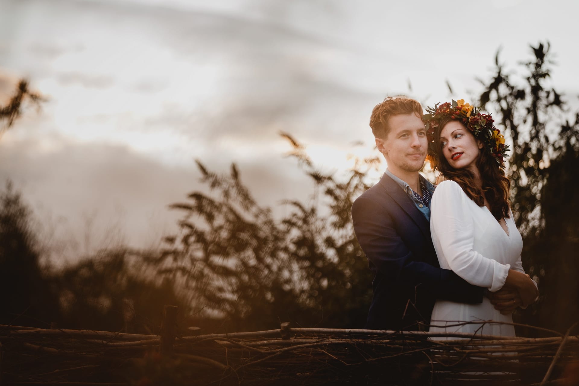 Married couple posing int he sunlight at The Bell in Ticehurst