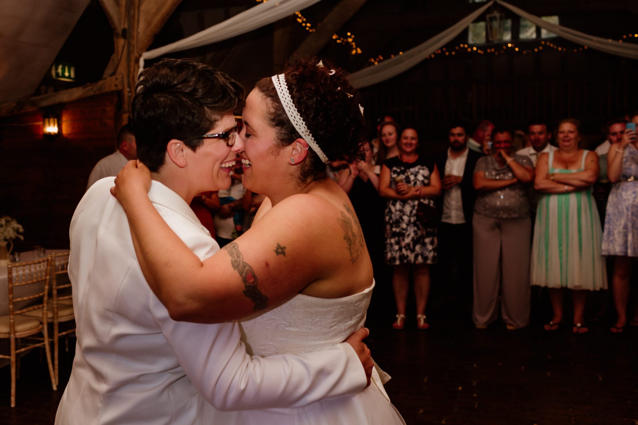 Laughing during two brides first dance at their wedding