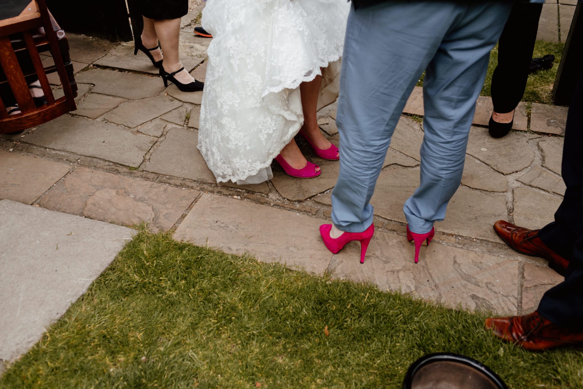 Man wearing heels at wedding -