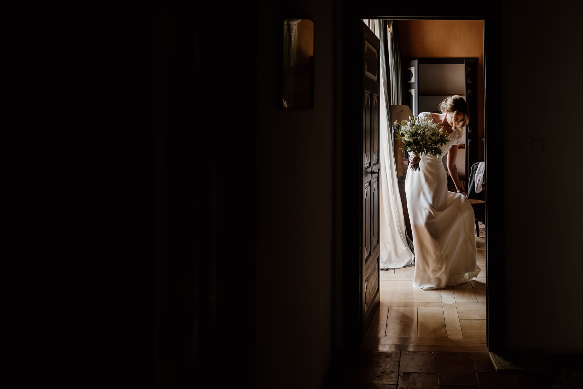 bride in the window light in france