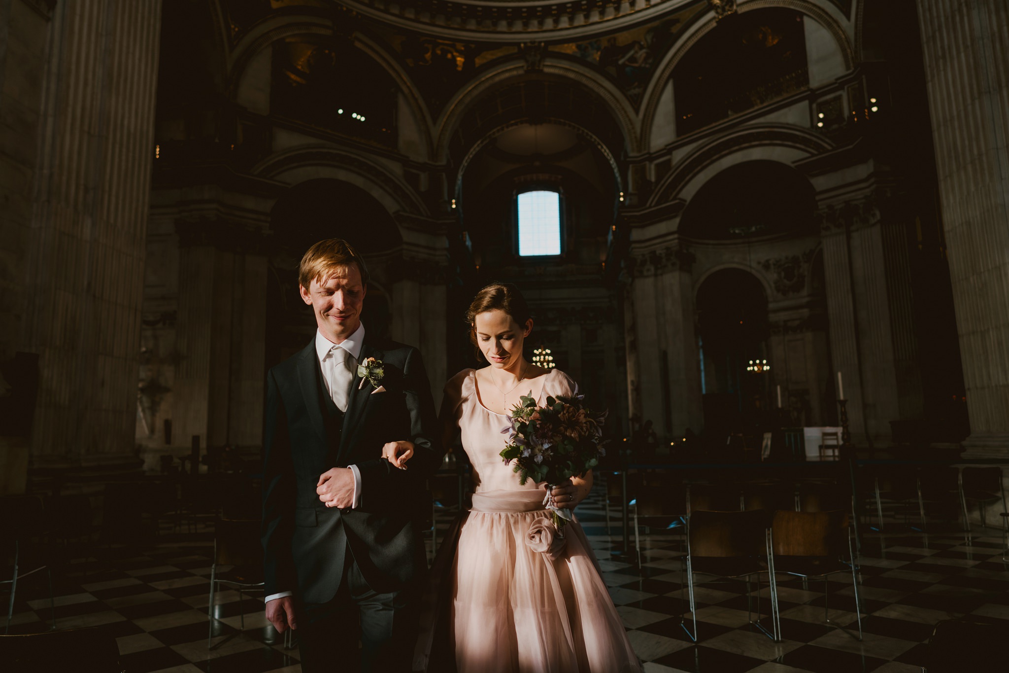 Bride and groom leaving St Paul's Cathedral - just married!