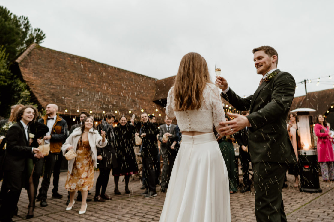 Bombarded by rice at Old Luxters Barn, Buckinghamshire wedding