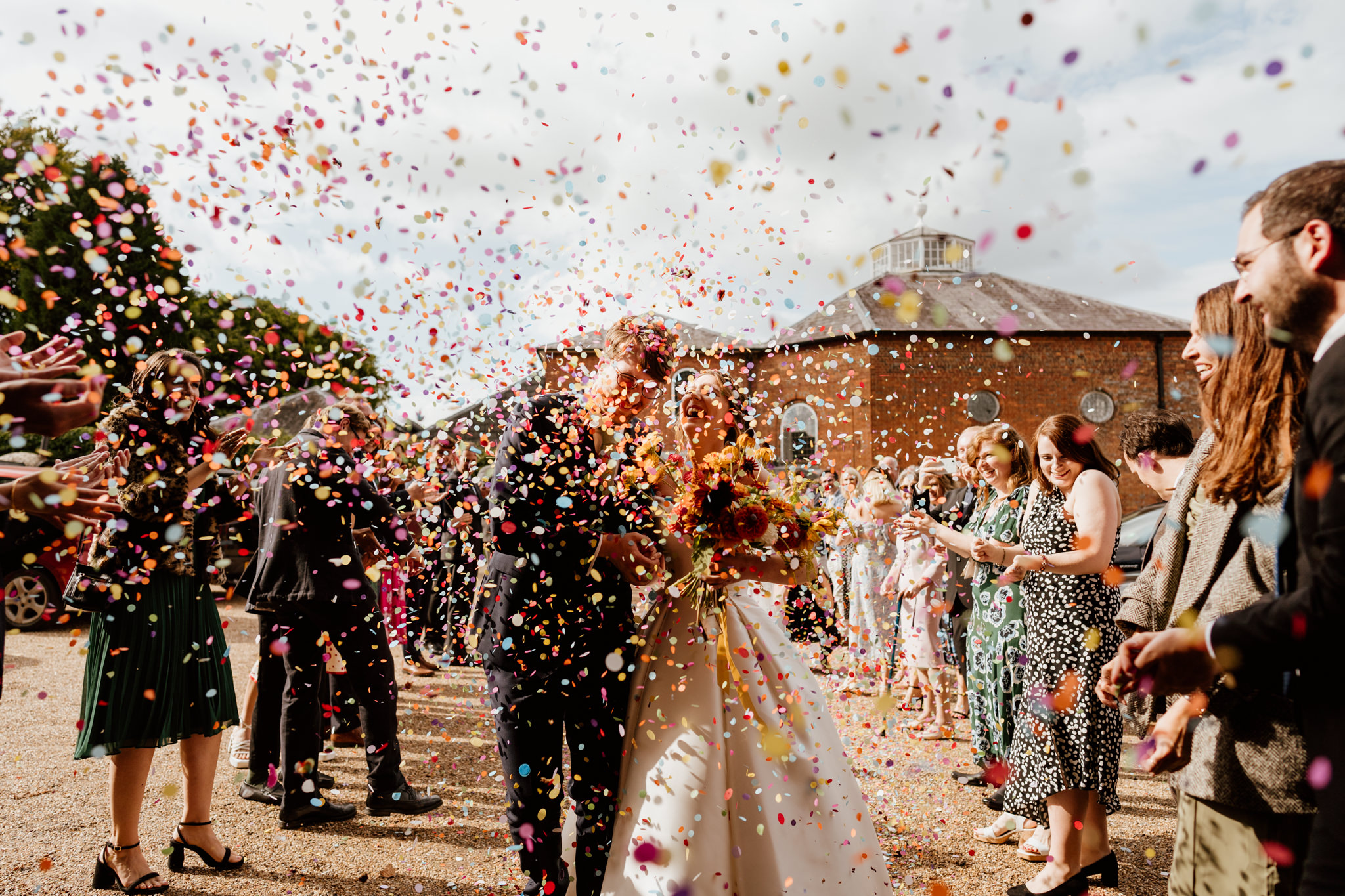 Lots of confetti at Kings Chapel Wedding Photography
