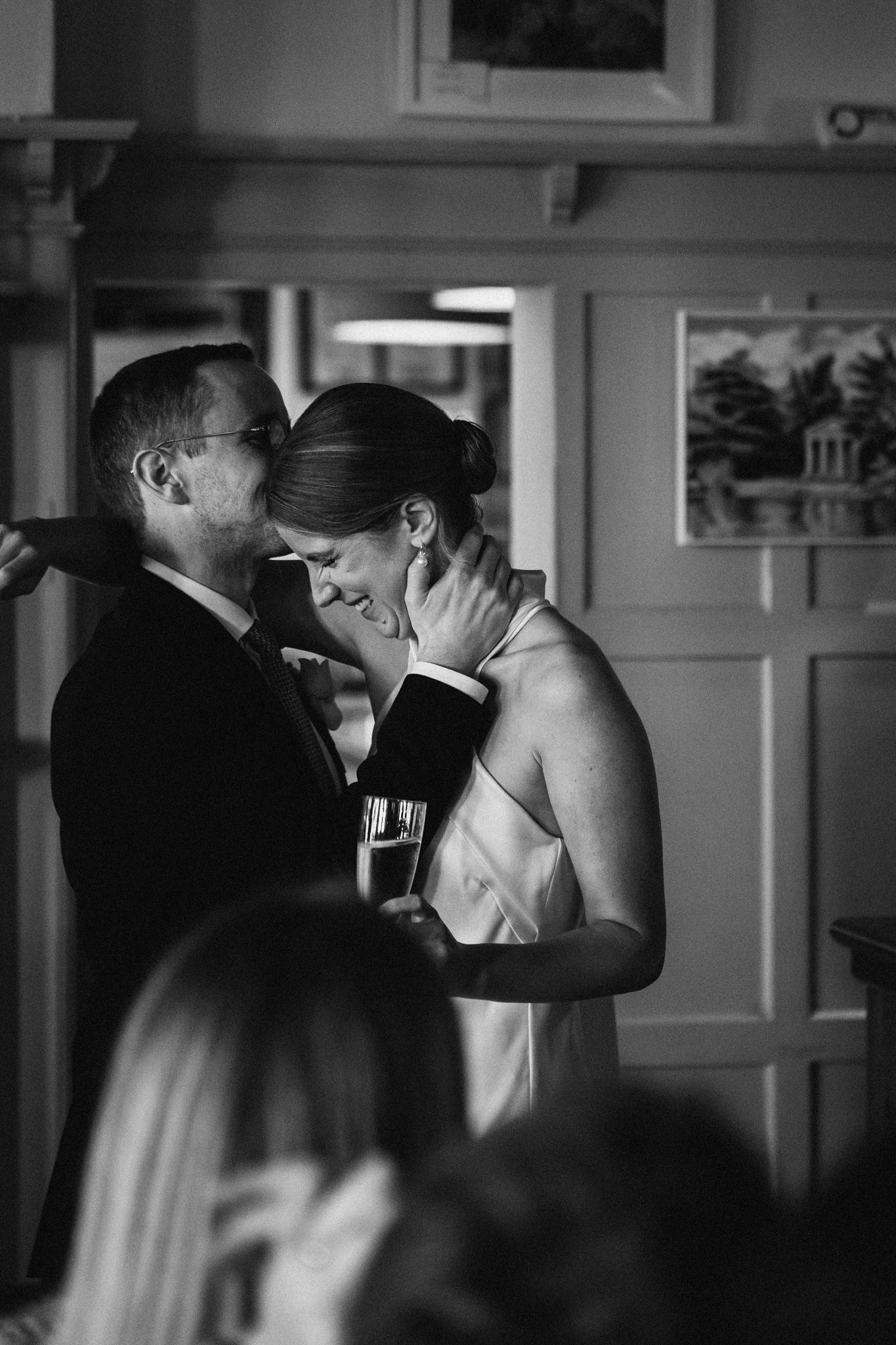 Groom kisses his bride - Documentary Wedding Photography