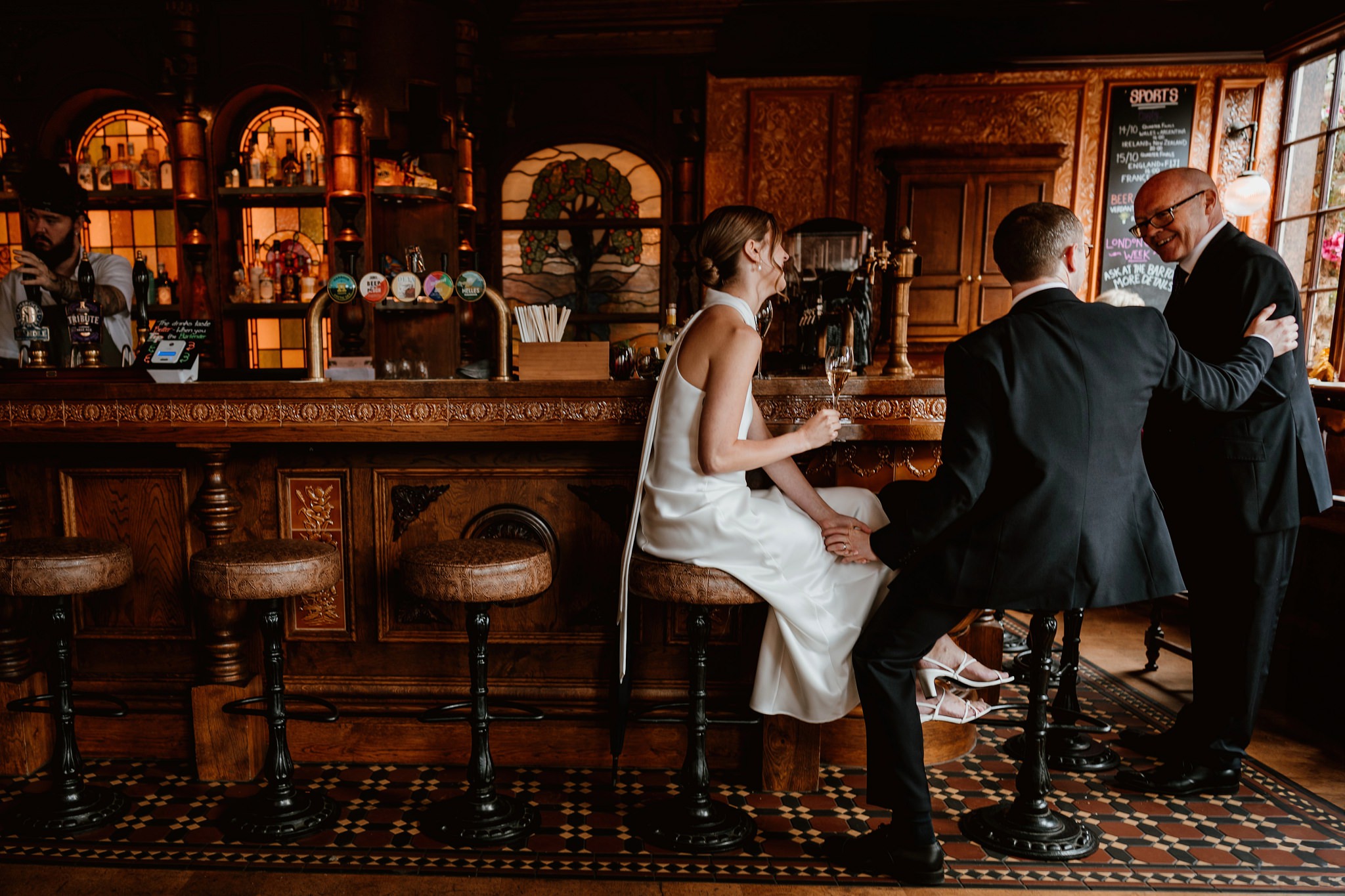 Meet new friends - Quiet moment for quick drink - Chelsea Town Hall Wedding Photography