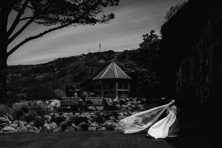 Capturing the wind in bride's veil using Artistic Documentary Wedding Photography