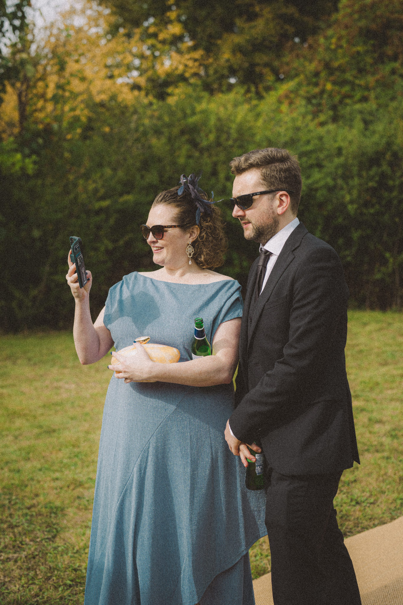 Guests pose happily at wedding - Bedfordshire Film Photographer