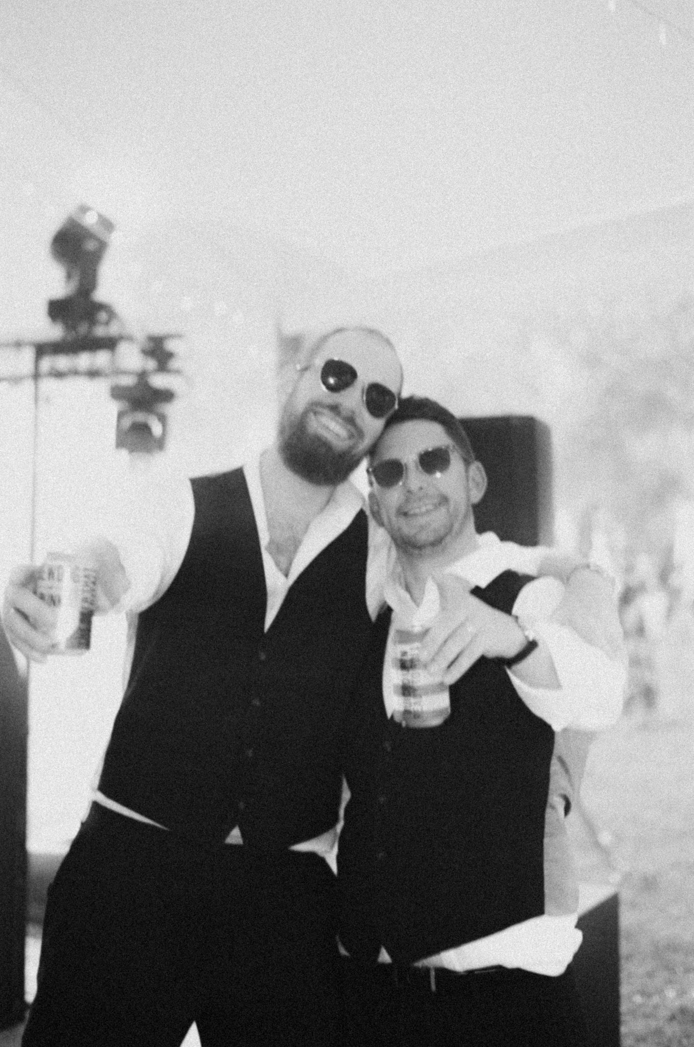 Guests pose happily at wedding - Bedfordshire Film Photographer