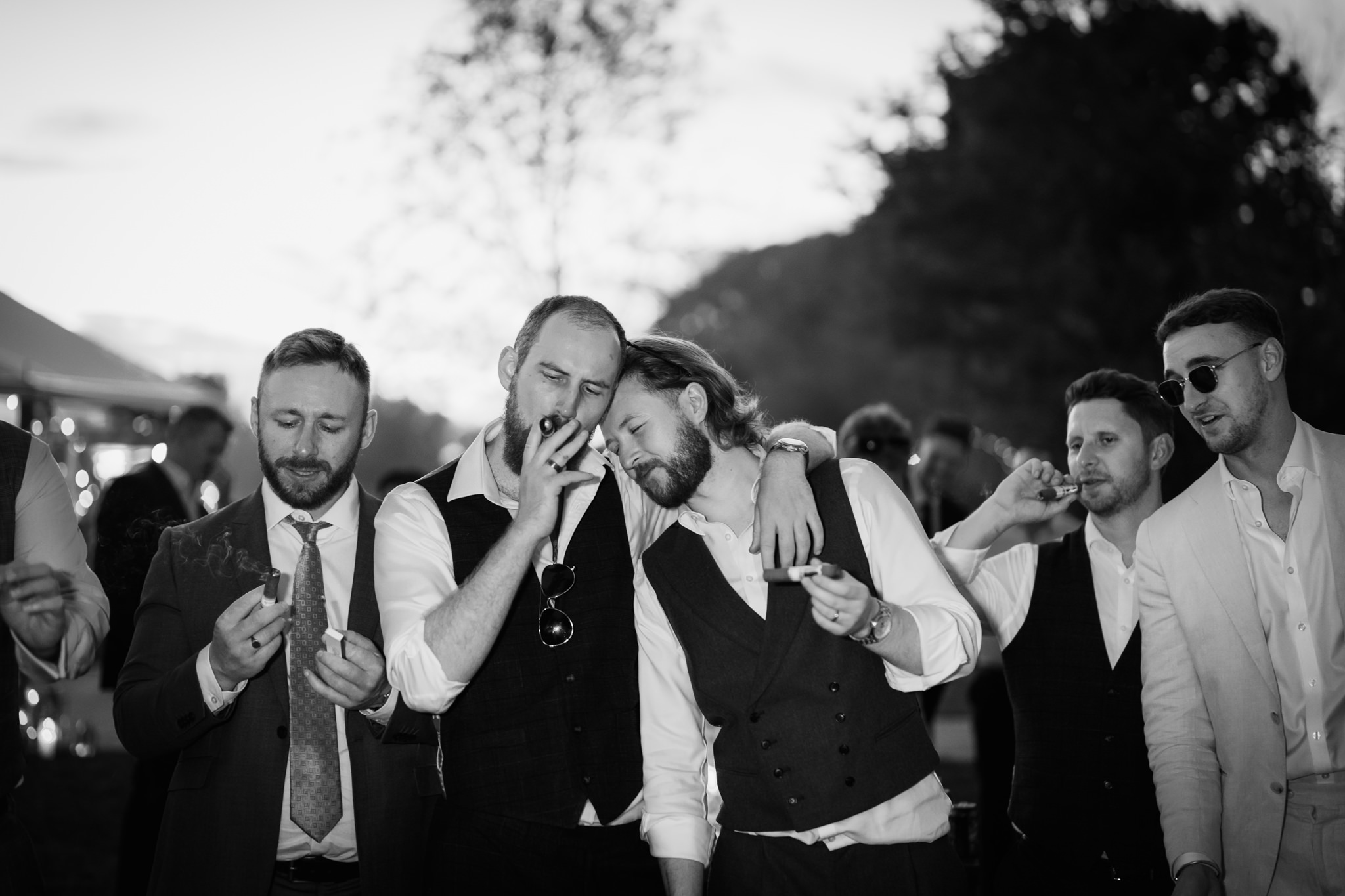 Groom relaxing with his best men - Bedfordshire Wedding Photographer