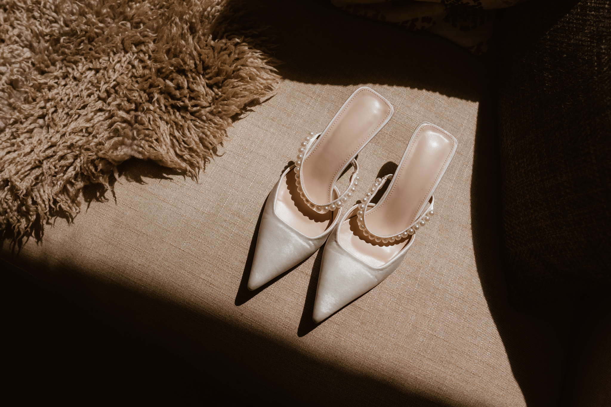 Bride shoes in light - Hertfordshire wedding photographer